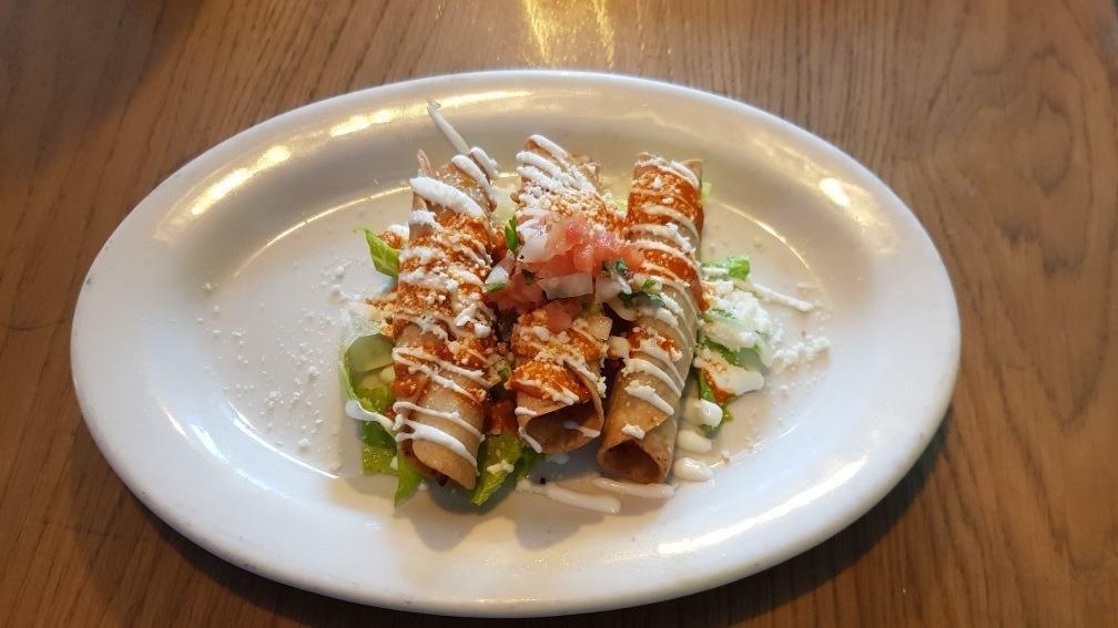 Flautas Appetizer · Rolled corn tortilla filled w/ shredded chicken, queso cotija, crema Mexicana, salsa verde
OR with vegetarian potato filling