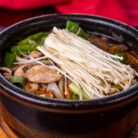 11. Ddook Bae Gi Bul Go Gi · Rib eye beef soup in hot stone bowl