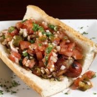 Mexi Dog · wrapped in bacon with jalapeño & onions.