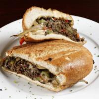 Philly Cheesesteak · onions, peppers, Swiss cheese.