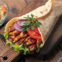 Mediterranean Gyro · Thin marinated slices of chicken, lettuce, tomatoes, onions, mushrooms topped with tzatziki ...