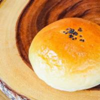 Red Bean Bread · Sweet bun with red bean filling. Contains: Wheat, Egg, Milk, and Soy