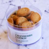 Cranberry Cookie  · Mini sugar cookies baked with cranberry in a cute tin. Contains: Wheat, Milk, Tree Nut (almo...