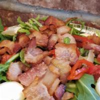 Bacon Arugula Salad · Peppadews, shaved parmigiano, fresh mozzarella, balsamic reduction, olive oil.