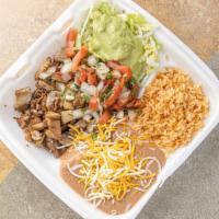 16. Carnitas Plate · Includes choice of 4 pieces of corn or 2 pieces of flour tortilla. includes rice and beans.
