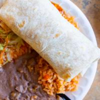 Chicken Burrito · Shredded chicken, refried beans, and rice.