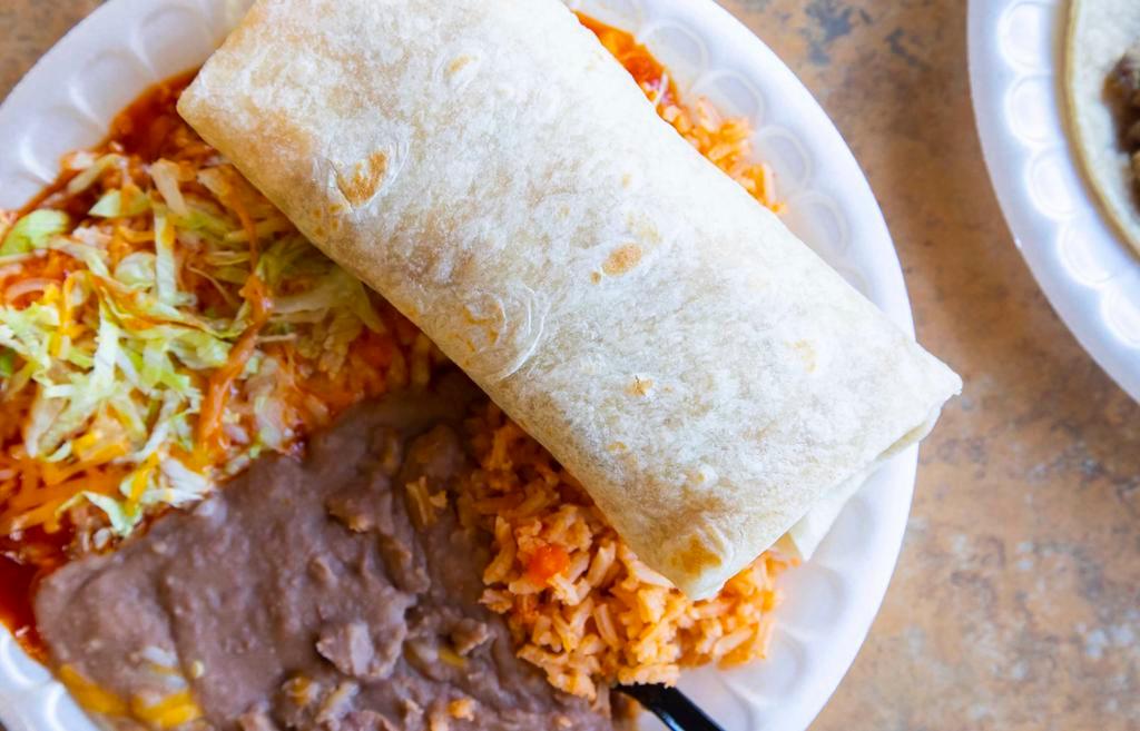 Chicken Burrito · Shredded chicken, refried beans, and rice.
