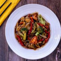 Pad Kee Mao · Wok fried flat wide rice noodles with spicy basil sauce, onions, broccoli, bell peppers and ...