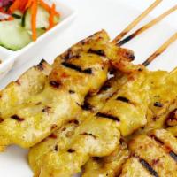 Chicken Satay · Barbeque marinated chicken served with cucumber sauce and peanut sauce.
