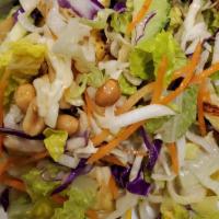 Thai Crunch Salad · Our signature salad romaine lettuce, cucumber, peanuts, carrot and red cabbage tossed with s...