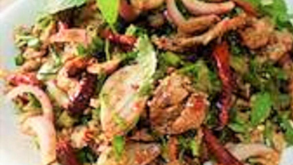 Grilled Beef Salad · Charcoal broiled sliced beef tossed with onion, cucumber, and lime dressing served with organic salad.