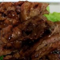 Grilled Pork with Sticky Rice · Grilled marinated pork served with sweet and sour sauce