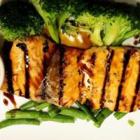 Salmon Satay · Grilled marinated salmon satay served with steamed broccoli and carrot with peanut sauce.