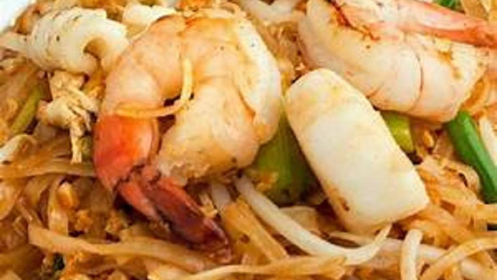 Pad Thai · Sauteed egg with thin noodles and your choice of meat or vegetable and tofu with green bean, bean sprouts, and peanut.