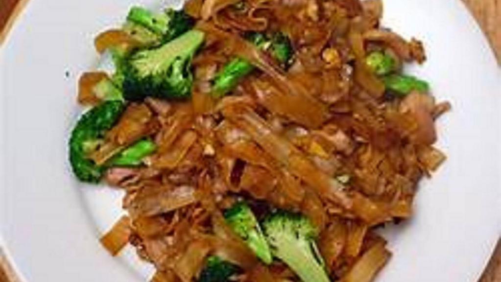 Pad See Eew · Sauteed wide rice noodles with your choice of meat or vegetables and tofu, egg, broccoli, carrot, and mushrooms.