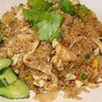 Thai Fried Rice · Fried rice with your choice of meat or vegetables and tofu with garlic, onion, tomatoes, and...