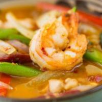 House Spicy Noodle Soup · With chicken, beef and prawn.