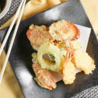Tempura · Two shrimp and mixed veggie deep fried with tempura batter.
