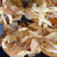 Takoyaki (6 Pcs.) · Deep fried octopus dumpling.