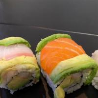 Rainbow · Cal roll top with four kinds of fish. Consuming raw or undercooked meats, poultry, seafood, ...
