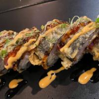 Godzilla Roll · Deep fried spicy tuna roll top with scallion tobiko eel sauce spicy mayo.