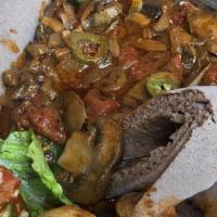 Mushroom Tibs · Vegetarian. Vegan. An excellent additional to plate with hearty meat like mushroom sauce coo...