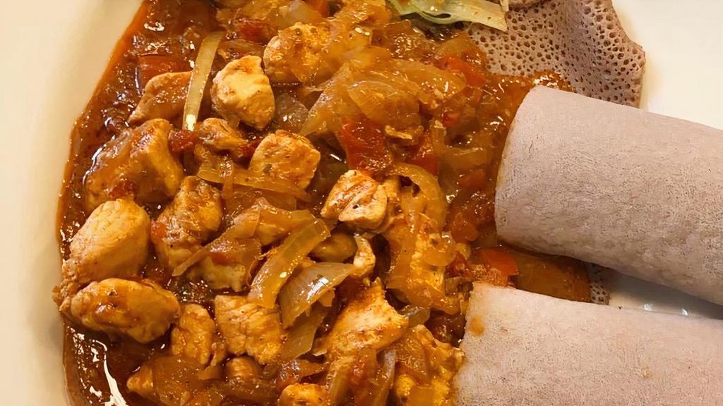Doro Tibs · Spicy. Chicken tender pieces of chicken sauteed in a rich mixture of garlic, ginger, onion, bell peppers, and traditional Ethiopian spices.