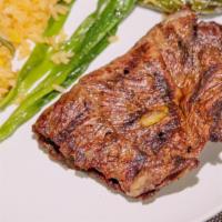 Carne Asada · Grilled steak.