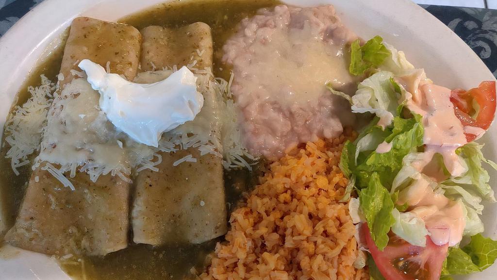 Enchiladas Virdes · 2 cheese, beef or chicken enchiladas sheered in our tangy green tomatillo sauce and topped with cream.