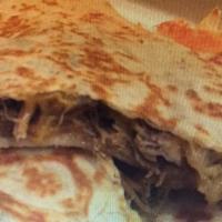 Super Quesadilla · Guacamole, sour cream, salsa and your choice of meat.