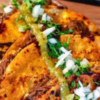 QUESA-BIRRIA  · (3  corn tortilla tacos) Birria, onion, cilantro  and melted mozzarella cheese..
Served with...