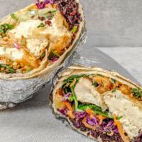 Vegan Larb Burrito · Poached garlic tofu and chickpeas with a citrusy toasted rice 