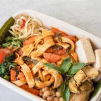 Curry Noodles · Baked turmeric chicken, poached garlic tofu, and chickpeas with a rich red curry sauce over ...