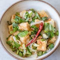 Larb the Laotian · Crispy garlic tofu tossed in a citrusy toasted rice 