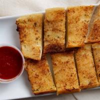 Garlic Bread · Served with pizza sauce.