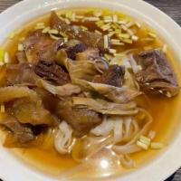Beef Flank Ho Fun Soup 柱候牛腩河粉 · Flat Noodle.