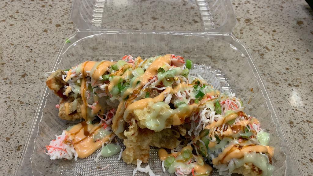 Deep in the Sea Roll · Assorted fried fish w/Crab meat and Avocado