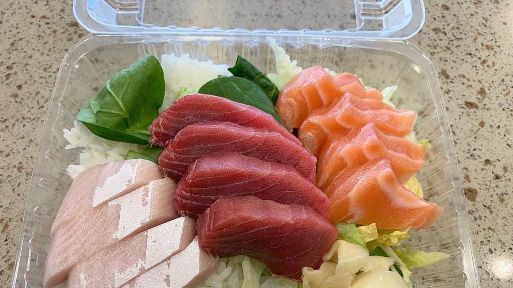 Combination Sashimi 12 pcs · Tuna 4pcs, Salmon 4 pcs and Hamachi 4 pcs