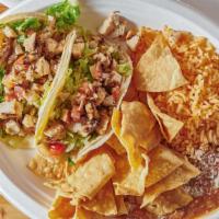 Tacos La Salsa Taco · Two soft corn tortilla taco filled with grilled chicken, steak or carnitas, lettuce, salsa M...