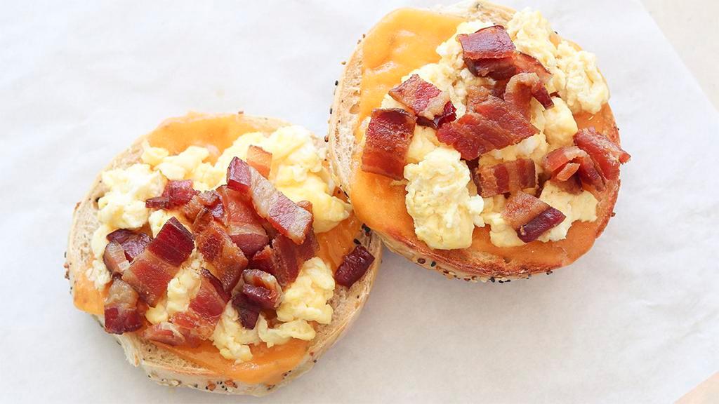 Classic Breakfast Bagel · Your choice of bagel, cheddar cheese, scrambled egg, and bacon.