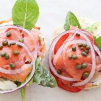 Traditional Lox · Your choice of bagel, plain cream cheese, smoked salmon, lettuce, tomato, red onion, and cap...