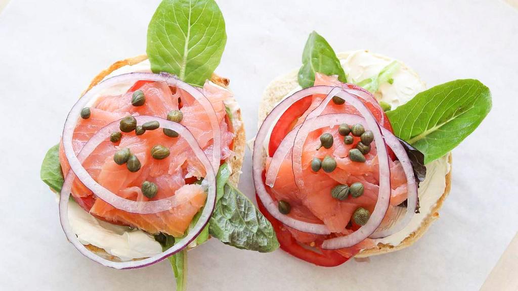Traditional Lox · Your choice of bagel, plain cream cheese, smoked salmon, lettuce, tomato, red onion, and capers.