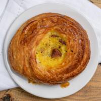 Sausage & Egg Danish · Flaky and buttery danish with egg and chopped sausage.