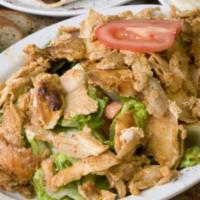 Chicken Doner Salad · Mixed green salad topped with chicken doner.