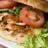 Chicken Doner Sandwich · Tender, thinly sliced marinated chicken roasted in upright grill.
