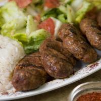 10. Kofte Kebab Plate · Charbroiled, minced lamb and beef with parsley, onion and seasoning. Served with rice, salad...