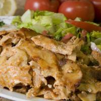 6. Chicken Doner  Plate · Tendered, thinly sliced chicken roasted in upright grill. Served with rice, salad and pita b...