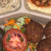 Vegetarian Combo Appetizer Plate · Hummus, Baba ghanoush, dolma and falafel.
