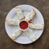 Cheesy Garlic Bread · Served with a side of marinara sauce
