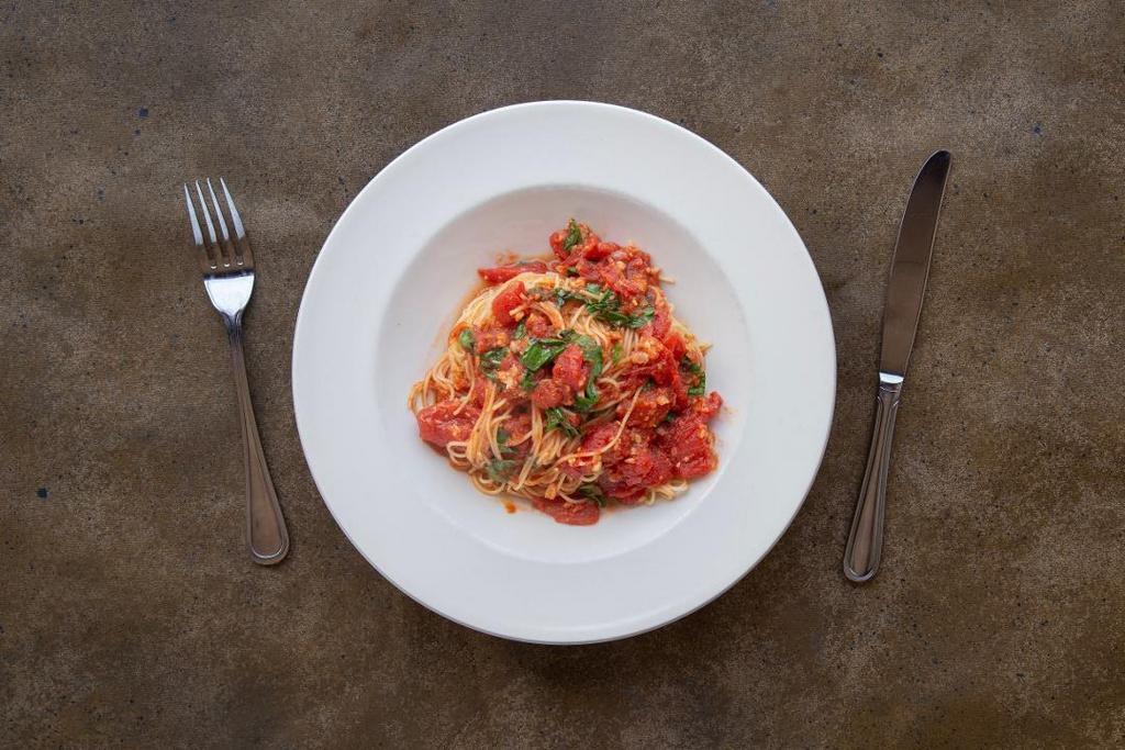 Cappellini Pomodoro · Tomatoes and fresh basil sautéed with garlic and olive oil